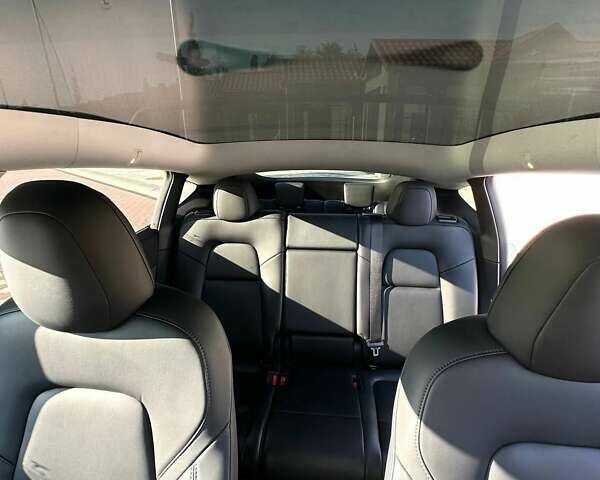 Тесла Model Y 2021 в Киеве на Automoto.ua Белый Тесла Model Y, объемом двигателя 0 л и пробегом 51 тыс. км за 27500 $, фото 12 на Automoto.ua