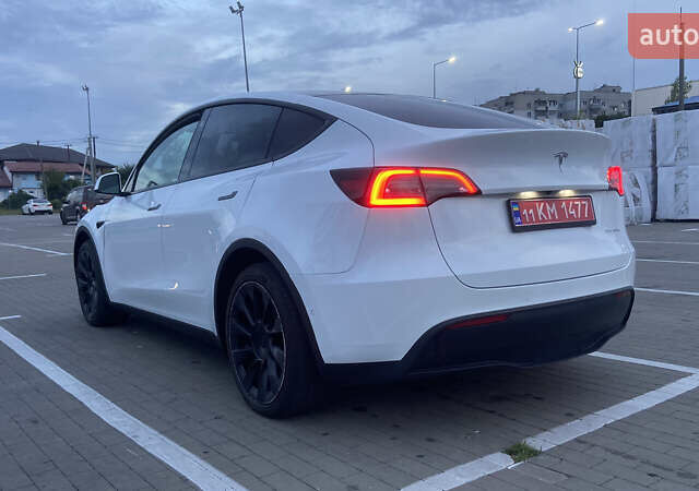 Белый Тесла Model Y, объемом двигателя 0 л и пробегом 81 тыс. км за 25000 $, фото 2 на Automoto.ua