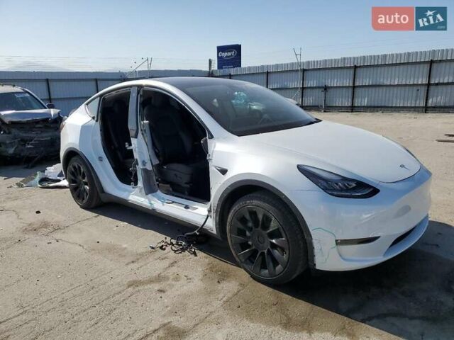 Белый Тесла Model Y, объемом двигателя 0 л и пробегом 74 тыс. км за 19000 $, фото 4 на Automoto.ua