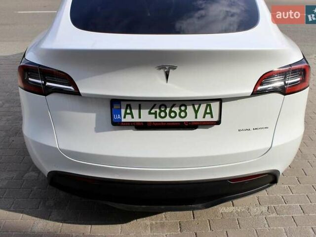 Белый Тесла Model Y, объемом двигателя 0 л и пробегом 67 тыс. км за 27000 $, фото 6 на Automoto.ua