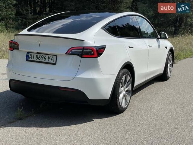 Белый Тесла Model Y, объемом двигателя 0 л и пробегом 65 тыс. км за 29999 $, фото 18 на Automoto.ua