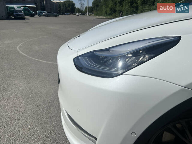Белый Тесла Model Y, объемом двигателя 0 л и пробегом 63 тыс. км за 25500 $, фото 10 на Automoto.ua