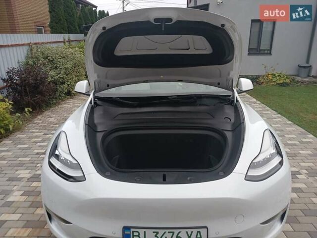 Белый Тесла Model Y, объемом двигателя 0 л и пробегом 195 тыс. км за 26000 $, фото 26 на Automoto.ua