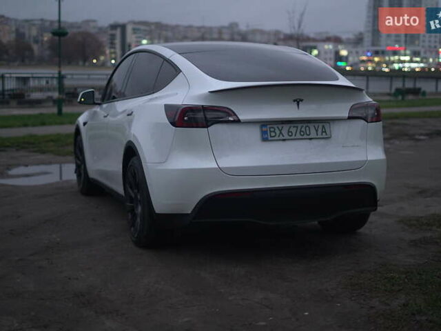 Білий Тесла Model Y, об'ємом двигуна 0 л та пробігом 66 тис. км за 23500 $, фото 60 на Automoto.ua