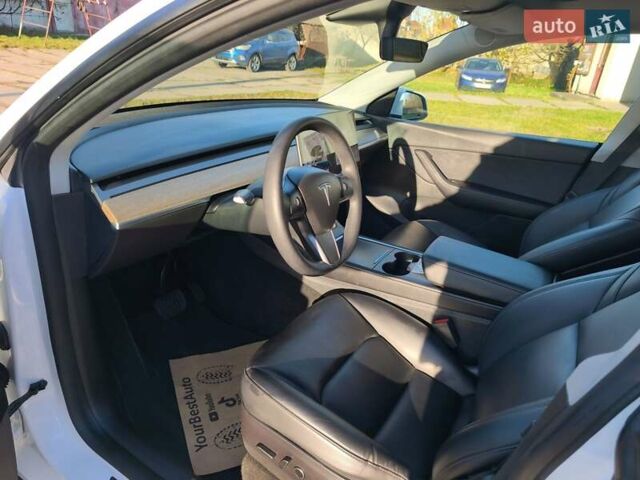 Білий Тесла Model Y, об'ємом двигуна 0 л та пробігом 86 тис. км за 25300 $, фото 10 на Automoto.ua
