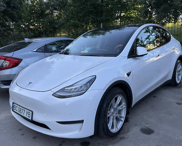 Белый Тесла Model Y, объемом двигателя 0 л и пробегом 92 тыс. км за 25200 $, фото 1 на Automoto.ua