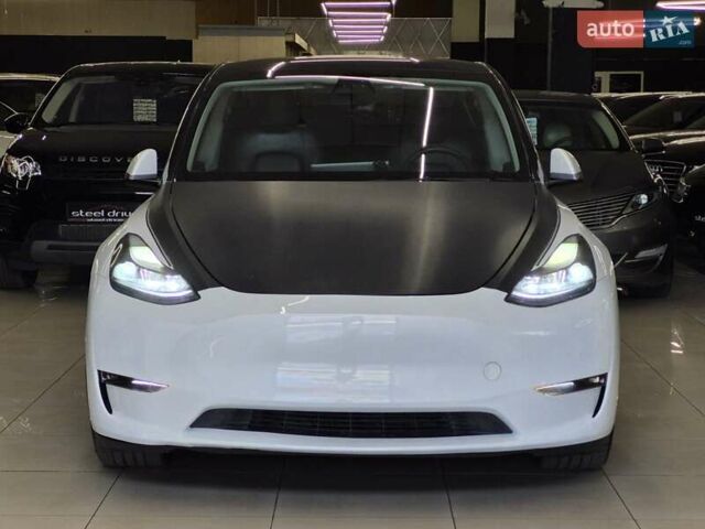 Білий Тесла Model Y, об'ємом двигуна 0 л та пробігом 58 тис. км за 26989 $, фото 4 на Automoto.ua