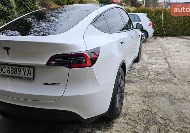 Белый Тесла Model Y, объемом двигателя 0 л и пробегом 99 тыс. км за 20000 $, фото 3 на Automoto.ua