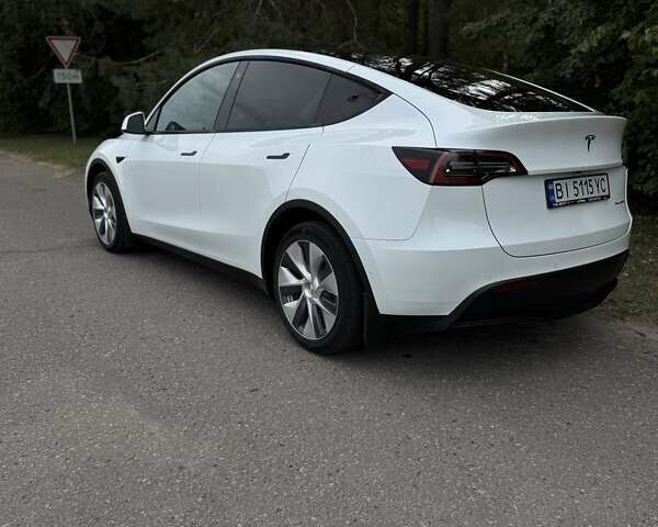 Белый Тесла Model Y, объемом двигателя 0 л и пробегом 79 тыс. км за 26500 $, фото 2 на Automoto.ua