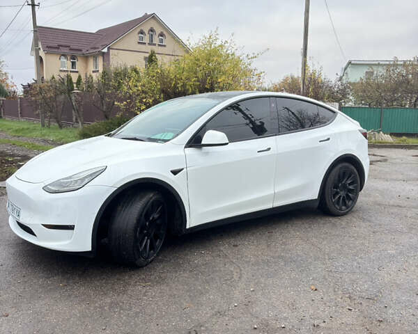 Білий Тесла Model Y, об'ємом двигуна 0 л та пробігом 83 тис. км за 22200 $, фото 1 на Automoto.ua