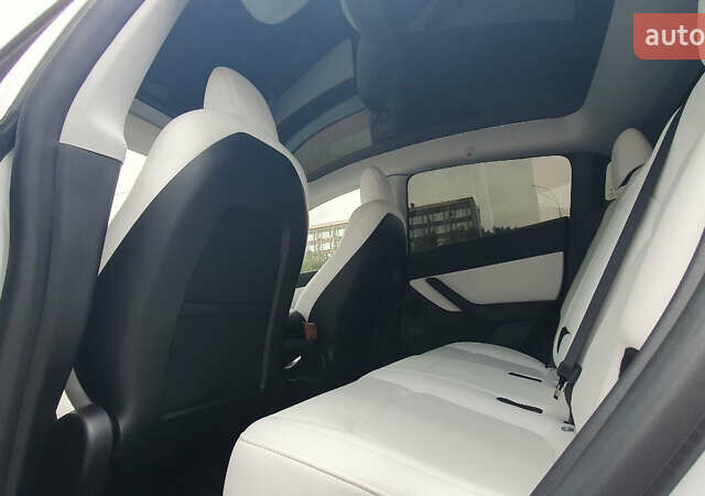 Білий Тесла Model Y, об'ємом двигуна 0 л та пробігом 74 тис. км за 25900 $, фото 15 на Automoto.ua