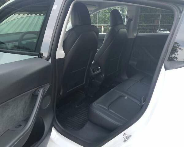 Белый Тесла Model Y, объемом двигателя 0 л и пробегом 58 тыс. км за 23400 $, фото 6 на Automoto.ua