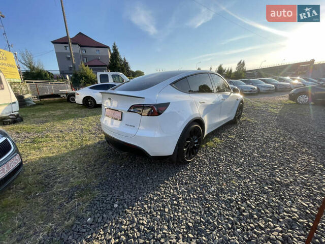 Белый Тесла Model Y, объемом двигателя 0 л и пробегом 52 тыс. км за 25900 $, фото 2 на Automoto.ua