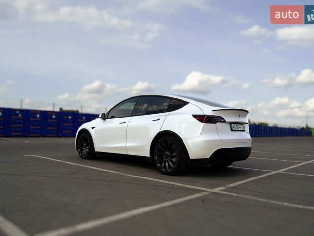Белый Тесла Model Y, объемом двигателя 0 л и пробегом 64 тыс. км за 34500 $, фото 1 на Automoto.ua