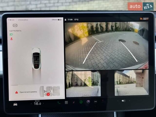 Белый Тесла Model Y, объемом двигателя 0 л и пробегом 98 тыс. км за 26499 $, фото 32 на Automoto.ua