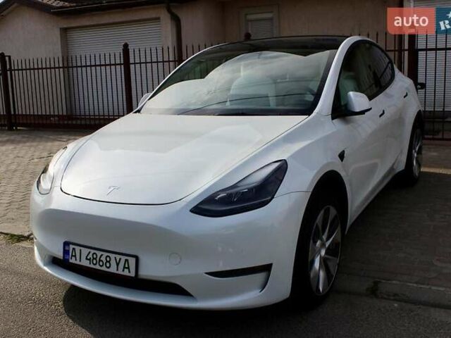 Белый Тесла Model Y, объемом двигателя 0 л и пробегом 67 тыс. км за 27000 $, фото 2 на Automoto.ua
