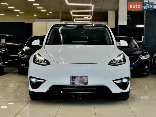 Білий Тесла Model Y, об'ємом двигуна 0 л та пробігом 74 тис. км за 24999 $, фото 1 на Automoto.ua