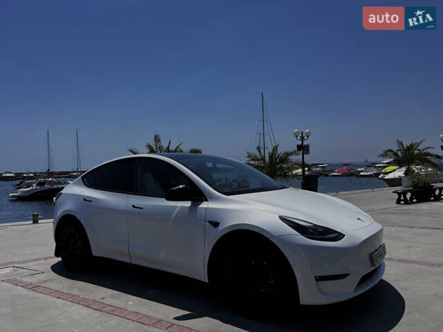Белый Тесла Model Y, объемом двигателя 0 л и пробегом 61 тыс. км за 28000 $, фото 10 на Automoto.ua