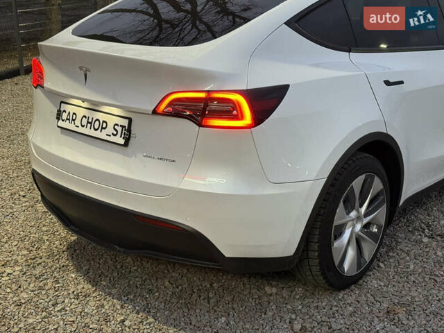 Белый Тесла Model Y, объемом двигателя 0 л и пробегом 128 тыс. км за 22600 $, фото 19 на Automoto.ua