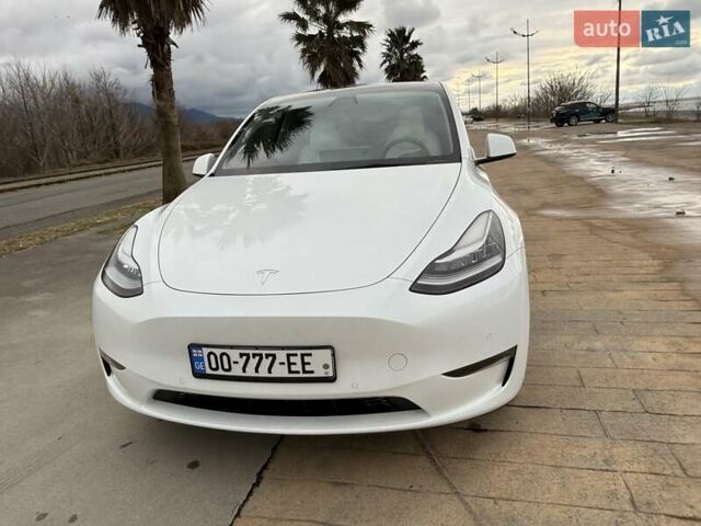 Белый Тесла Model Y, объемом двигателя 0 л и пробегом 58 тыс. км за 23000 $, фото 6 на Automoto.ua