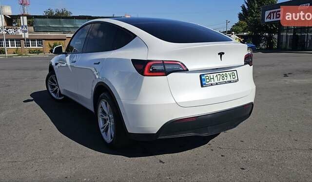 Белый Тесла Model Y, объемом двигателя 0 л и пробегом 119 тыс. км за 24000 $, фото 2 на Automoto.ua