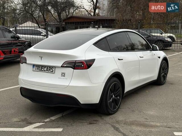 Белый Тесла Model Y, объемом двигателя 0 л и пробегом 80 тыс. км за 25500 $, фото 2 на Automoto.ua