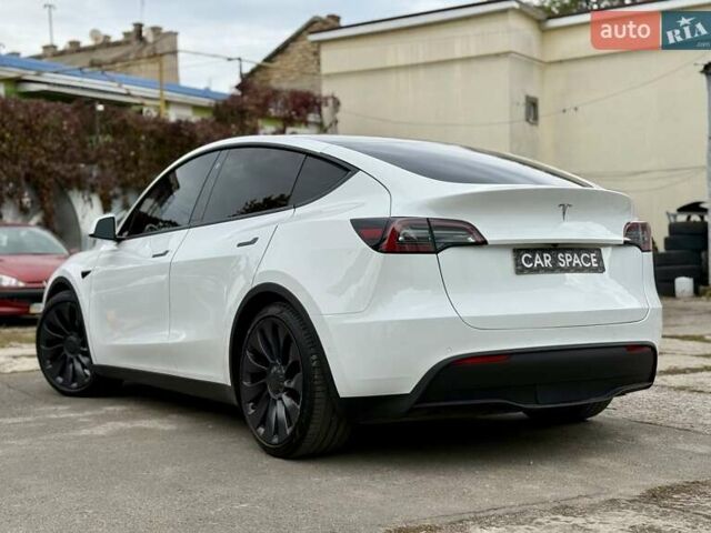 Белый Тесла Model Y, объемом двигателя 0 л и пробегом 88 тыс. км за 26999 $, фото 11 на Automoto.ua
