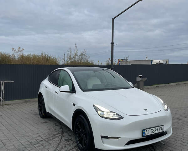 Белый Тесла Model Y, объемом двигателя 0 л и пробегом 55 тыс. км за 28000 $, фото 10 на Automoto.ua