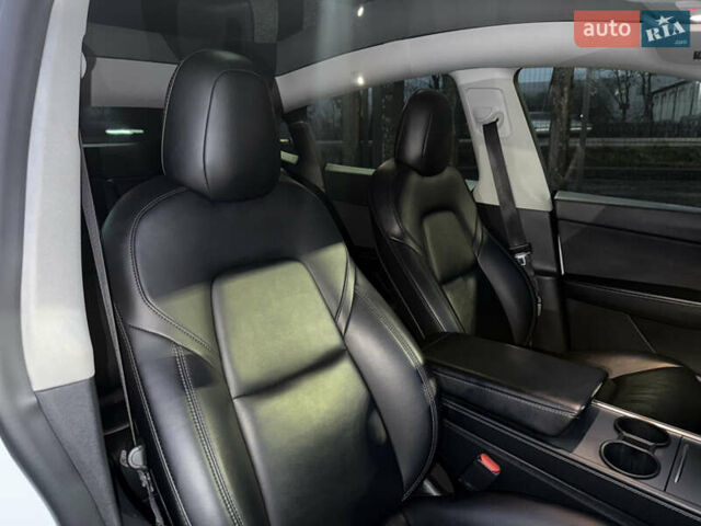 Белый Тесла Model Y, объемом двигателя 0 л и пробегом 128 тыс. км за 22600 $, фото 62 на Automoto.ua