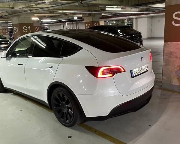 Білий Тесла Model Y, об'ємом двигуна 0 л та пробігом 119 тис. км за 23600 $, фото 1 на Automoto.ua