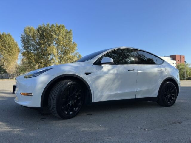 Білий Тесла Model Y, об'ємом двигуна 0 л та пробігом 73 тис. км за 29400 $, фото 6 на Automoto.ua