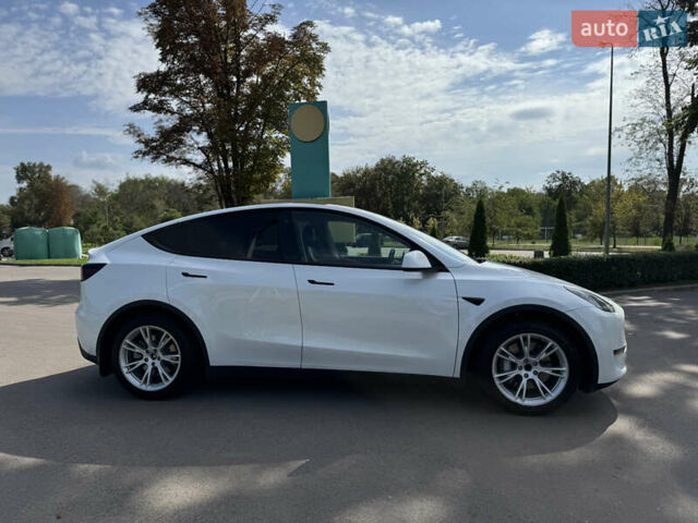 Білий Тесла Model Y, об'ємом двигуна 0 л та пробігом 119 тис. км за 19499 $, фото 3 на Automoto.ua