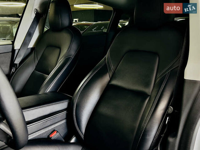 Білий Тесла Model Y, об'ємом двигуна 0 л та пробігом 74 тис. км за 24979 $, фото 10 на Automoto.ua