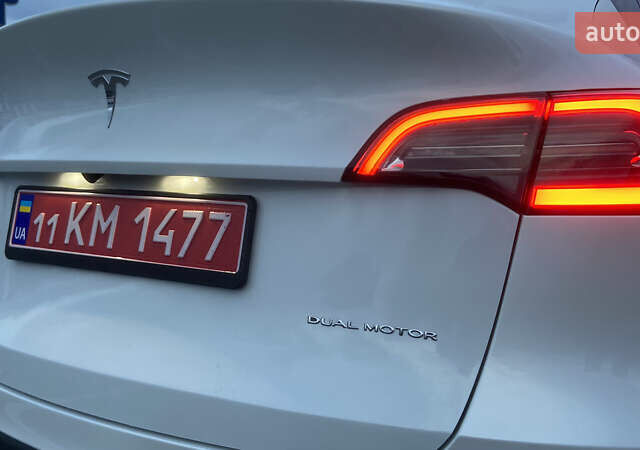 Белый Тесла Model Y, объемом двигателя 0 л и пробегом 81 тыс. км за 25000 $, фото 4 на Automoto.ua