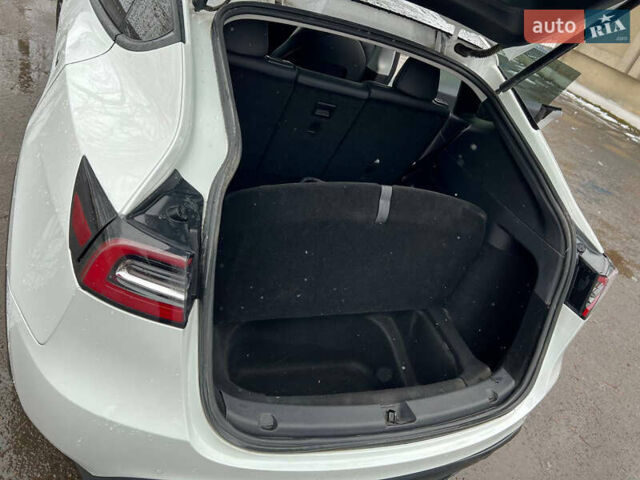 Білий Тесла Model Y, об'ємом двигуна 0 л та пробігом 88 тис. км за 24900 $, фото 20 на Automoto.ua