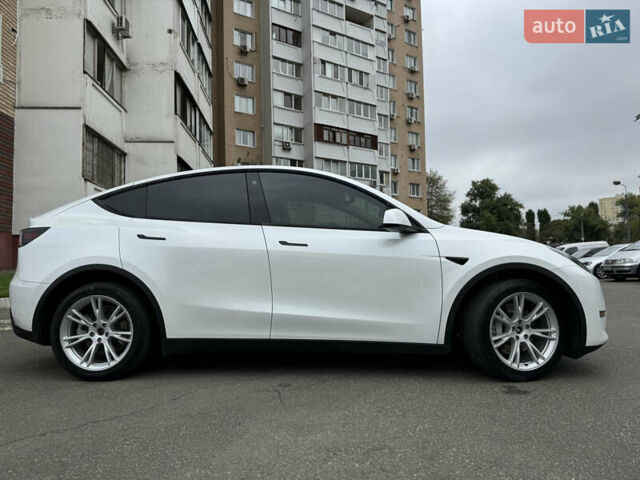 Белый Тесла Model Y, объемом двигателя 0 л и пробегом 51 тыс. км за 29780 $, фото 2 на Automoto.ua