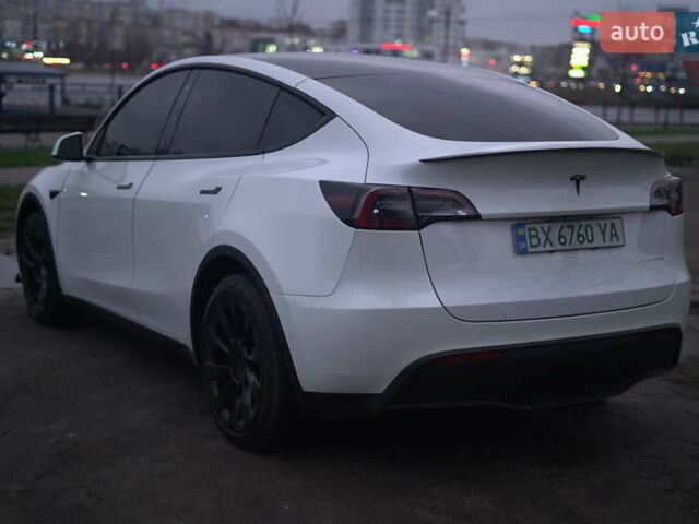 Білий Тесла Model Y, об'ємом двигуна 0 л та пробігом 66 тис. км за 23500 $, фото 61 на Automoto.ua