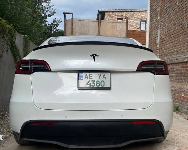 Білий Тесла Model Y, об'ємом двигуна 0 л та пробігом 76 тис. км за 20800 $, фото 13 на Automoto.ua