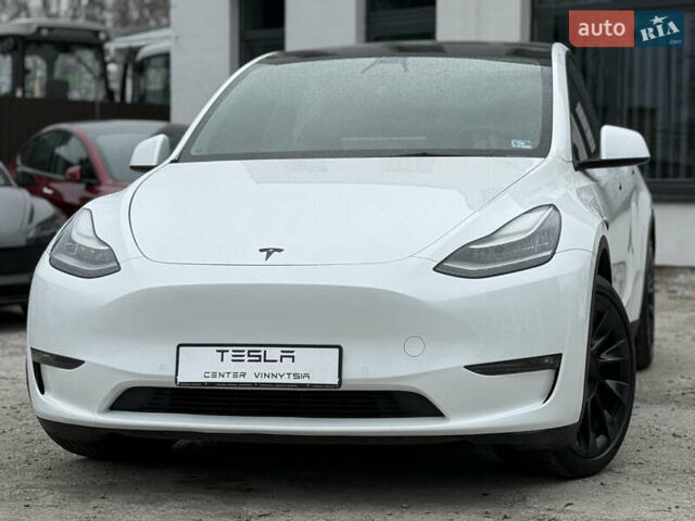 Белый Тесла Model Y, объемом двигателя 0 л и пробегом 77 тыс. км за 24200 $, фото 2 на Automoto.ua