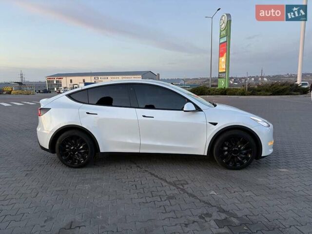 Белый Тесла Model Y, объемом двигателя 0 л и пробегом 84 тыс. км за 23700 $, фото 1 на Automoto.ua
