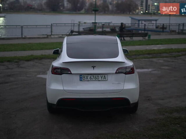 Білий Тесла Model Y, об'ємом двигуна 0 л та пробігом 66 тис. км за 23500 $, фото 63 на Automoto.ua