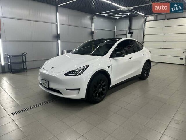 Білий Тесла Model Y, об'ємом двигуна 0 л та пробігом 91 тис. км за 19200 $, фото 1 на Automoto.ua