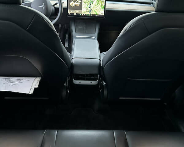 Белый Тесла Model Y, объемом двигателя 0 л и пробегом 85 тыс. км за 39800 $, фото 6 на Automoto.ua