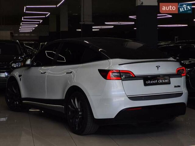 Білий Тесла Model Y, об'ємом двигуна 0 л та пробігом 58 тис. км за 26989 $, фото 2 на Automoto.ua