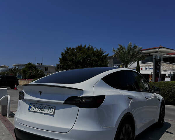 Белый Тесла Model Y, объемом двигателя 0 л и пробегом 61 тыс. км за 28000 $, фото 5 на Automoto.ua