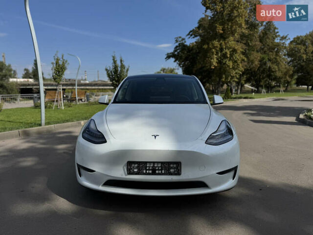 Білий Тесла Model Y, об'ємом двигуна 0 л та пробігом 119 тис. км за 19499 $, фото 1 на Automoto.ua