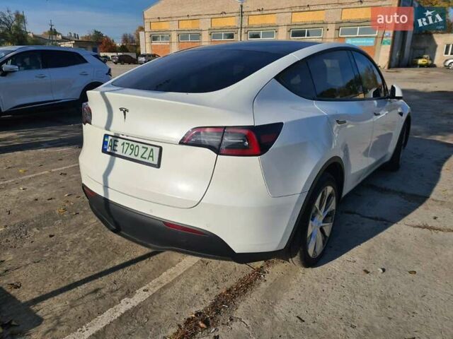 Белый Тесла Model Y, объемом двигателя 0 л и пробегом 68 тыс. км за 27000 $, фото 1 на Automoto.ua