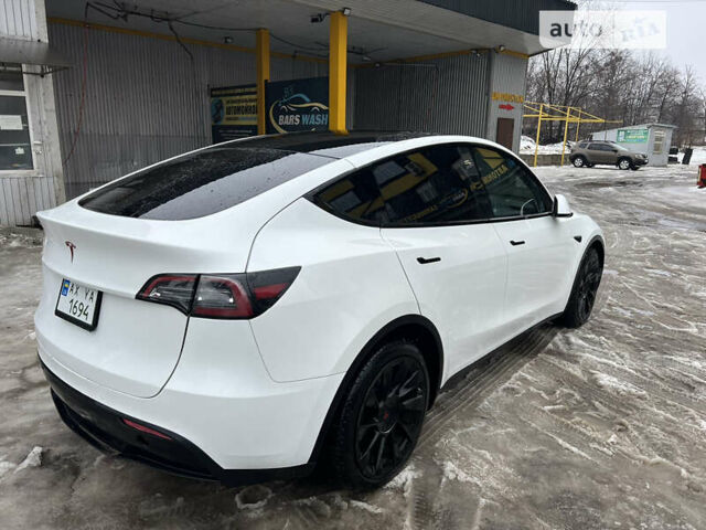 Белый Тесла Model Y, объемом двигателя 0 л и пробегом 57 тыс. км за 36900 $, фото 4 на Automoto.ua