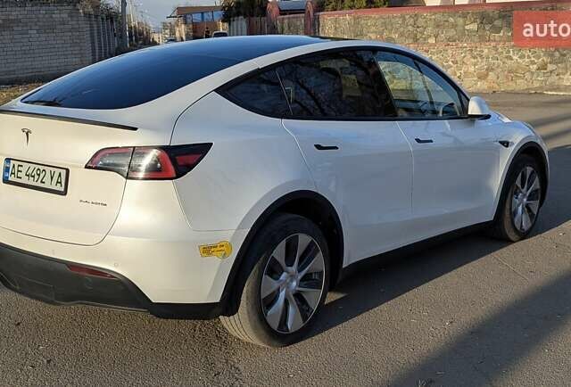 Білий Тесла Model Y, об'ємом двигуна 0 л та пробігом 101 тис. км за 23899 $, фото 26 на Automoto.ua