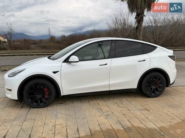 Белый Тесла Model Y, объемом двигателя 0 л и пробегом 58 тыс. км за 23000 $, фото 3 на Automoto.ua